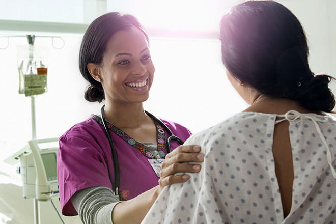 Woman talking with a nurse